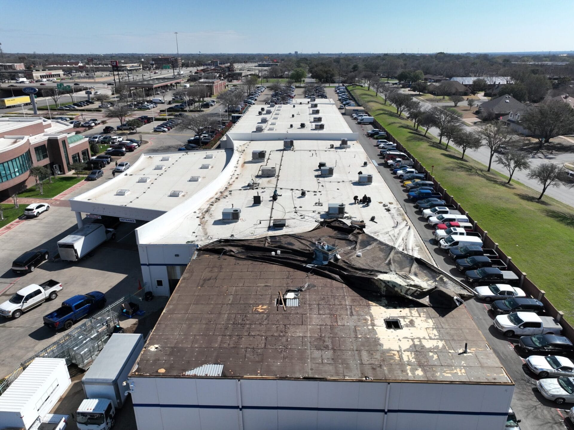 top view of a storm-damaged roof